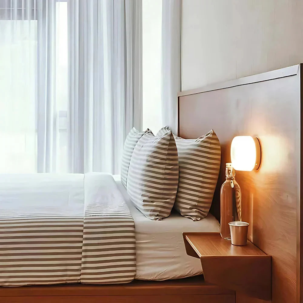 Modern Glass Wall Sconce With Adjustable LED Glow