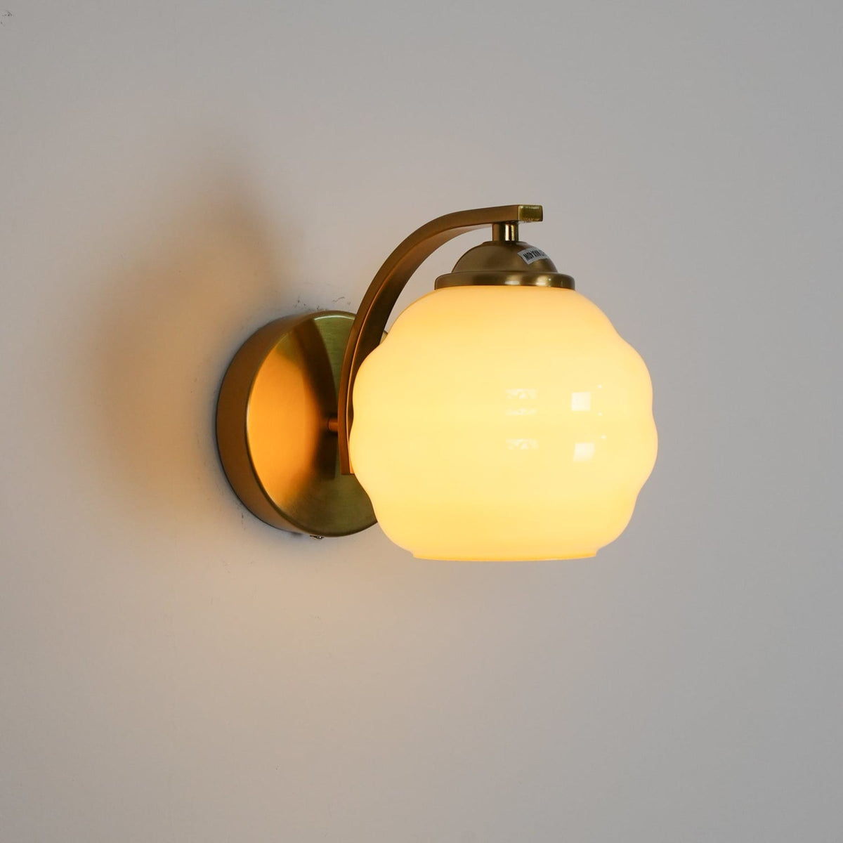 Modern Iron and Glass Wall Sconce With Warm LED Glow