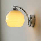 Modern Iron and Glass Wall Sconce With Warm LED Glow