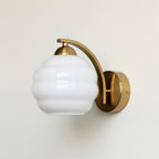Modern Iron and Glass Wall Sconce With Warm LED Glow