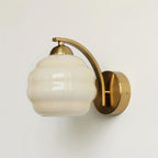Modern Iron and Glass Wall Sconce With Warm LED Glow