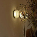 Modern Glass Wall Sconce With Adjustable LED Glow