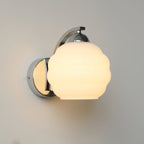 Modern Iron and Glass Wall Sconce With Warm LED Glow