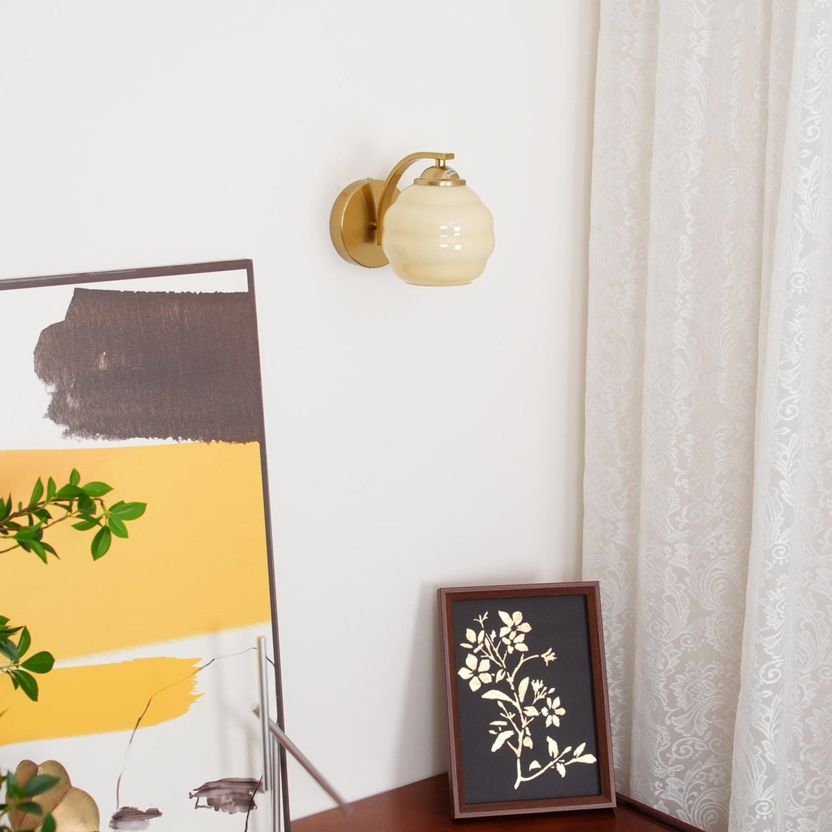 Modern Iron and Glass Wall Sconce With Warm LED Glow