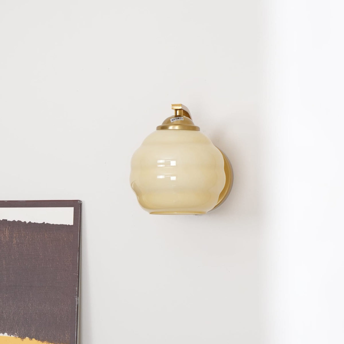 Modern Iron and Glass Wall Sconce With Warm LED Glow