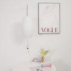 Ribbed Oval Wall Sconce With Pull Chain And Curved Arm