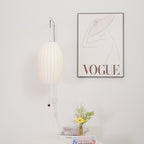 Ribbed Oval Wall Sconce With Pull Chain And Curved Arm