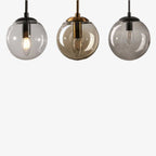 Hanging Glass Globe Wall Sconce With Swing Arm
